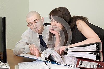 Bookkeeper and the secretary on a workplace Stock Photo