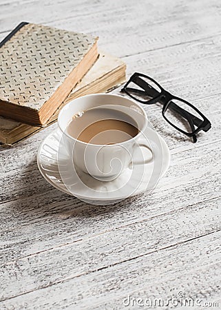 Books, glasses and coffee cup Stock Photo