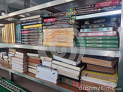Books and the Koran arranged on the Mosque Shelf, Jakarta 29 August 2023 Editorial Stock Photo