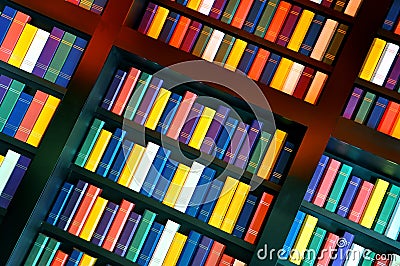 Books on library shelves Stock Photo