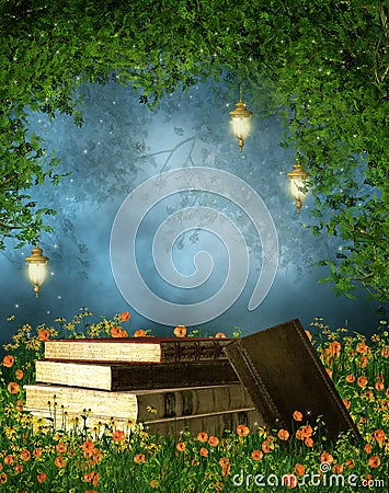 Books on a meadow Stock Photo