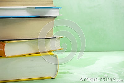 Books stack on the wooden chair for business, education back to school concept. Stock Photo