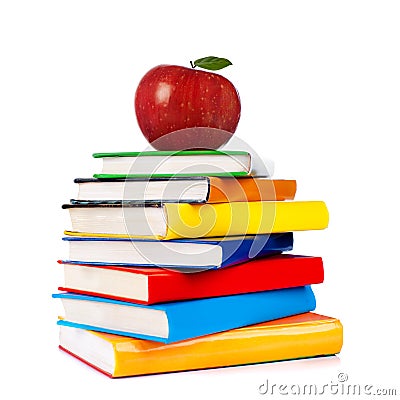 Books tower with apple isolated on white Stock Photo