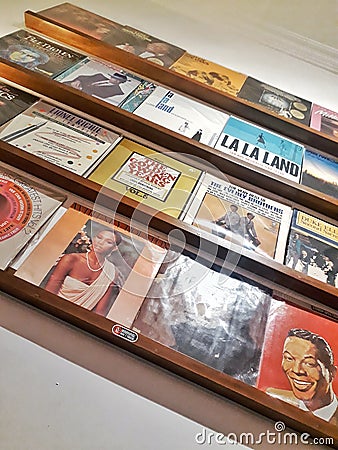 Bookshelf full with vinyl record in corner of the room Editorial Stock Photo