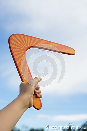 Boomerang in front of a blue sky Stock Photo