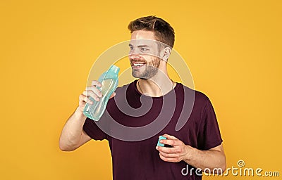 boost energy. Thirsty fitness male enjoying refreshing drink. concept of drinking water benefits. man drinking water Stock Photo