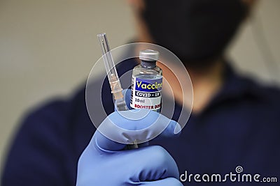 Booster dose vaccine for protect covid-19 virus. Stock Photo
