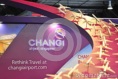 Booth of Changi Airport Group (CAG) with Rethink Travel slogan at Singapore Airshow Editorial Stock Photo