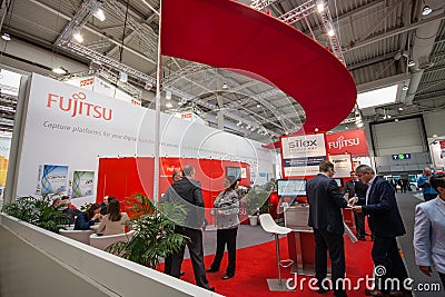 Booth of Fujitsu company at CeBIT information technology trade show Editorial Stock Photo