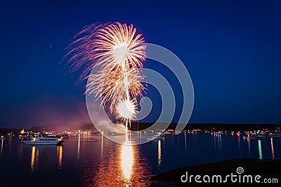 Boats in the harbor during fireworks display, slow shutter, motion blur Editorial Stock Photo