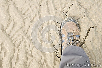 Boots cracking sand Stock Photo