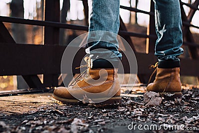 Boots Overlooking Bridge Stock Photo