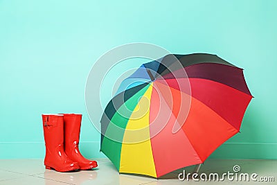 Boots with umbrella Stock Photo