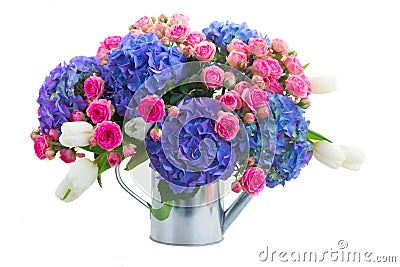 Boquet of white tulips, pink roses and blue hortensia flowers Stock Photo