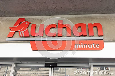 Auchan minute logo brand and text sign facade of French group of local city Editorial Stock Photo