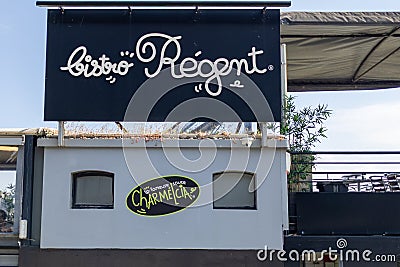 Bistro regent French Bar restaurant sign text and logo brand on terrace panel signroad Editorial Stock Photo