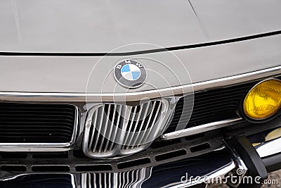 BMW logo brand text and logo sign on grill old timer vintage retro front car hood face Editorial Stock Photo