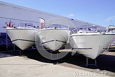 Boats in Stock for sale in shop modern motor boat for sale in outdoor store Editorial Stock Photo