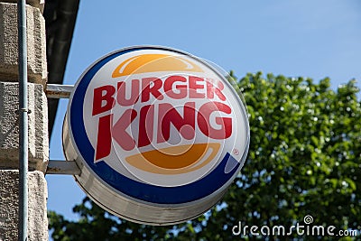 Burger King restaurant sign text and brand logo wall facade us fast food franchise Editorial Stock Photo