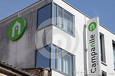 Campanile Hotel logo sign wall and text brand hostel facade wall building white green Editorial Stock Photo