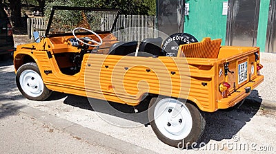 Citroen Mehari car orange vintage buggy old retro beach convertible vehicle Editorial Stock Photo