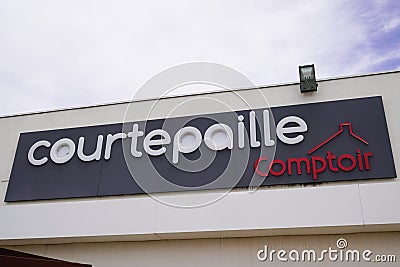 Courtepaille grill brand text and sign logo on entrance restaurant facade wall Editorial Stock Photo