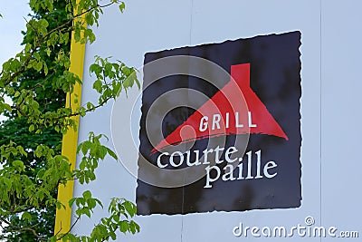 Courtepaille grill brand text and sign logo on restaurant facade wall Editorial Stock Photo