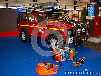 Bordeaux , Aquitaine / France - 03 03 2020 : defender land rover fireman gear accessories on firefighter red car in french fire Editorial Stock Photo