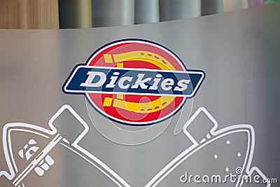 Dickies logo brand and sign text on facade windows store wall for us fashion boutique Editorial Stock Photo