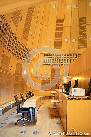 Empty courtroom with judge and clerks workplace modern design interior wooden Editorial Stock Photo