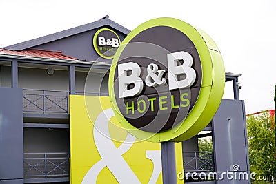 Bordeaux , Aquitaine / France - 09 24 2019 : facade large neon-lit B and B hotels with neon lights hotel entrance Editorial Stock Photo