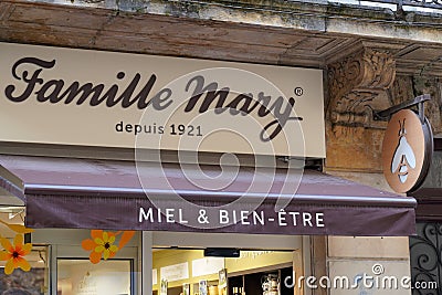 Famille Mary logo and text sign on boutique beekeeper shop of honey product in city Editorial Stock Photo