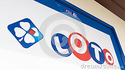 FDJ La Francaise des Jeux and loto advertising sign on wall lotto dealership Editorial Stock Photo