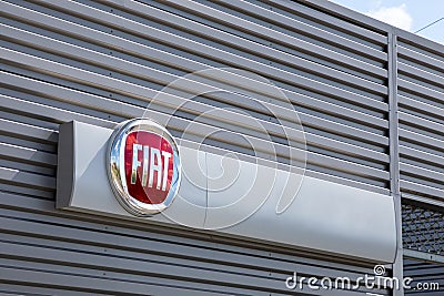 Fiat logo sign car store showroom dealership text brand on station facade wall garage Editorial Stock Photo