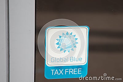 Global Blue tax free logo brand and sign text on windows entrance shop of Amex US Editorial Stock Photo