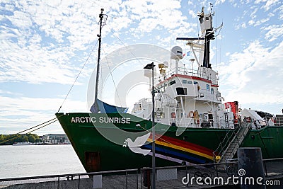 Greenpeace Arctic Sunrise green boat logo and text sign on ship Editorial Stock Photo