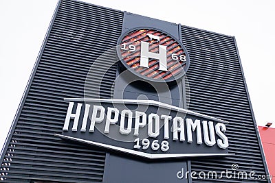 Hippopotamus restaurant brand logo and sign text front of entrance specialist in beef Editorial Stock Photo