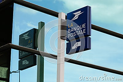 La Banque Postale logo atm and text sign blue front of store brand office French bank Editorial Stock Photo