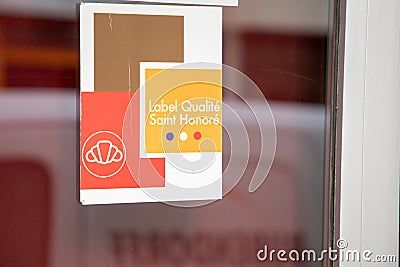 Label qualite saint honore brand logo and sign text front of french bakery traditional Editorial Stock Photo