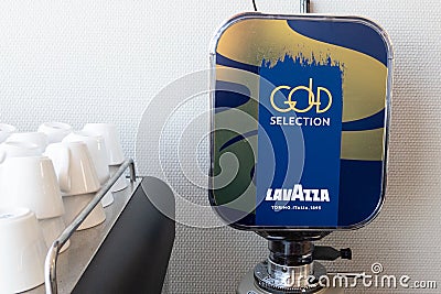 Lavazza logo brand and text sign on machine coffee shop advertising in bar restaurant Editorial Stock Photo