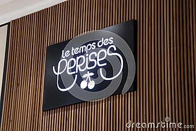 le temps des cerises logo brand and text sign wall store signage facade french Editorial Stock Photo