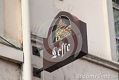 Leffe Belgian beer sign logo and brand text on wall entrance bar restaurant facade Editorial Stock Photo