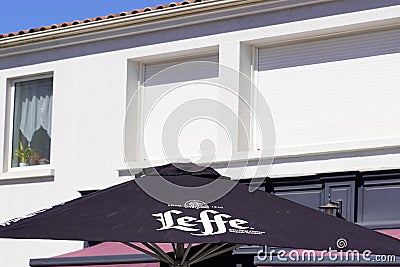 Leffe Belgian beer sign text and brand logo on bar terrace restaurant shop Editorial Stock Photo