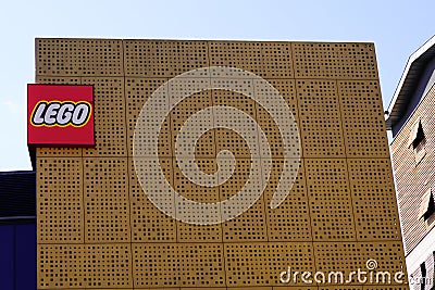 Lego brand logo and sign on flagship store Imagination Center shop building for cell Editorial Stock Photo