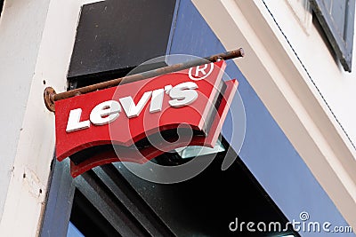 Levi`s red sign and text logo Levi Strauss levis American clothing company of denim Editorial Stock Photo