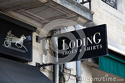 Loding logo brand and text sign front facade store Shoes and shirts shop fashion Editorial Stock Photo