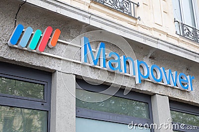 manpower sign brand and text logo on wall entrance facade of employment staffing Editorial Stock Photo