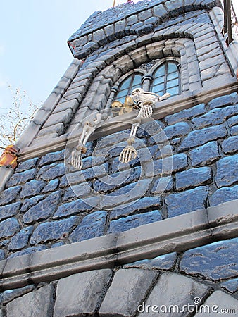 Bordeaux , Aquitaine / France - 11 19 2019 : medieval tower of a fairground ghost train with skeleton in decoration Editorial Stock Photo