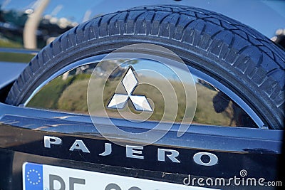 Mitsubishi Pajero rear spare wheel back view sign logo car and brand text Editorial Stock Photo