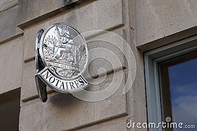 Notaire french sign logo and text silver on wall aside entrance to the notary office Editorial Stock Photo
